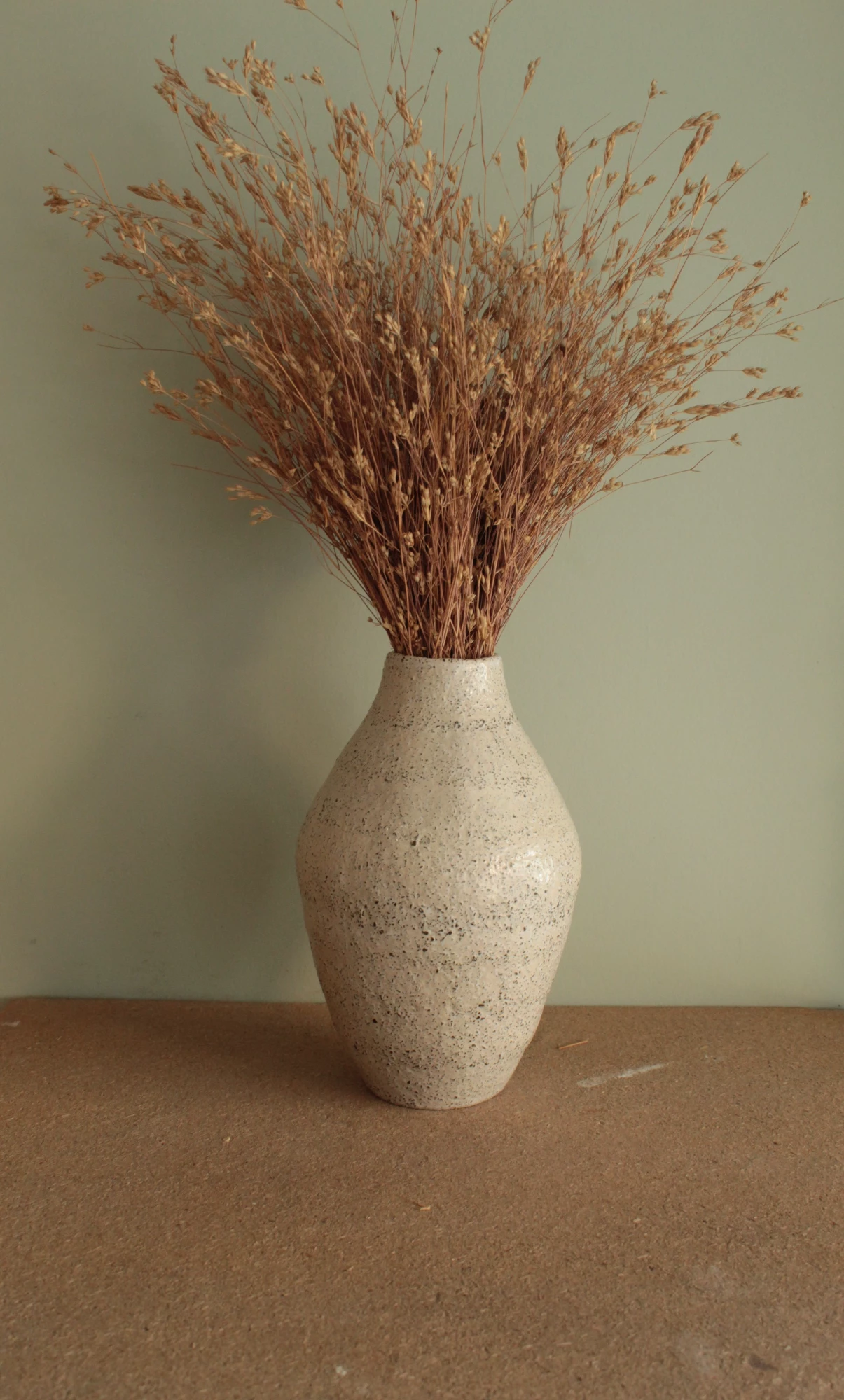 White vase with rocks