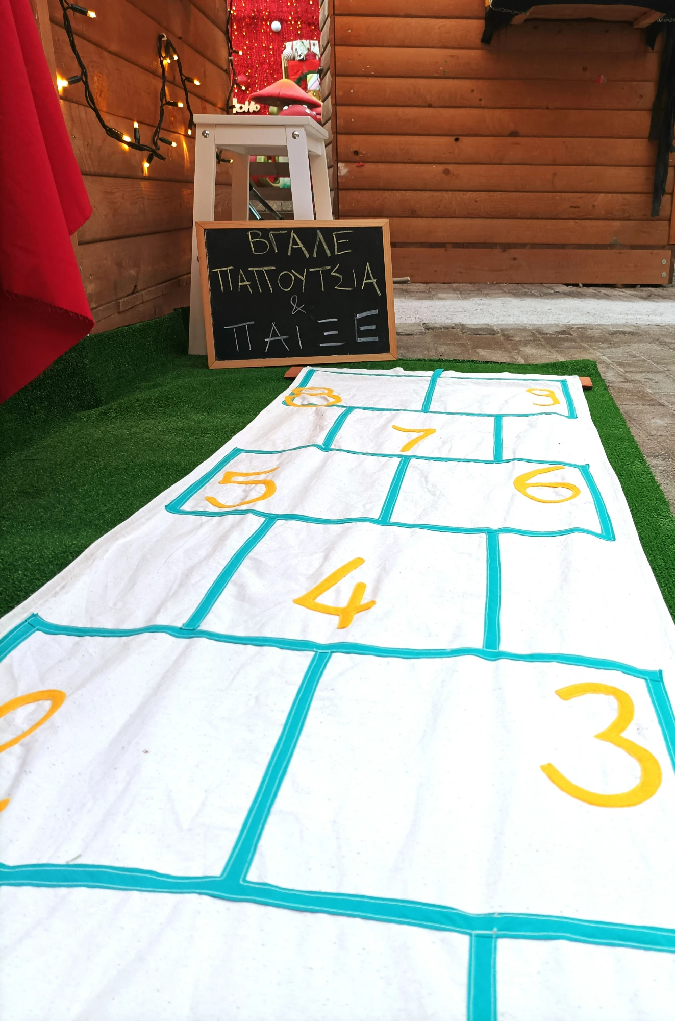 the HOPSCOTCH portable floor game