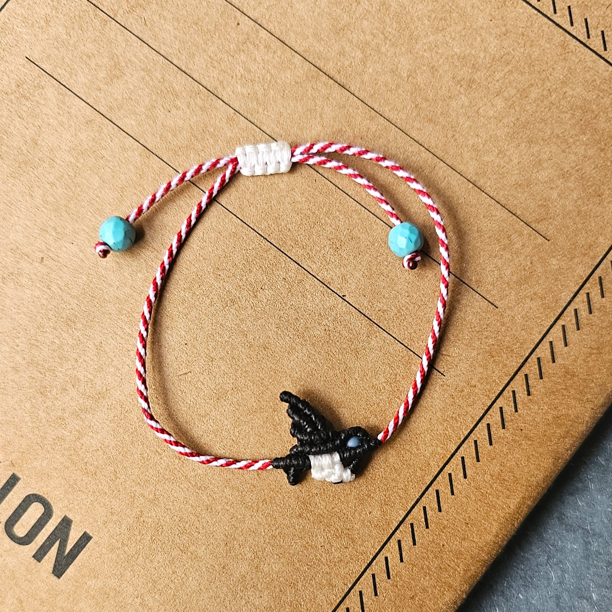 First Sun Swallow, βραχιόλι Μάρτη
