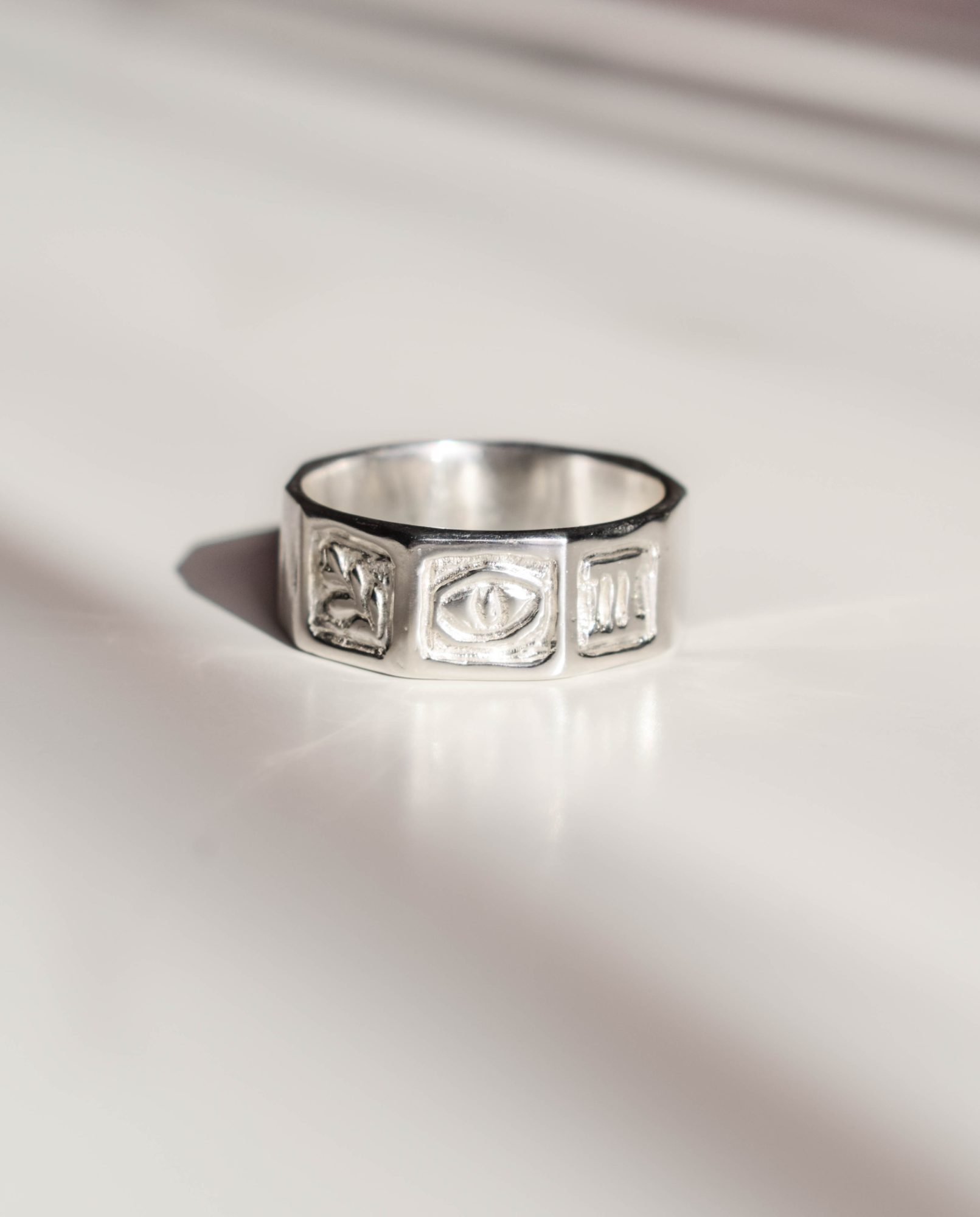 Simple band ring with an evil eye