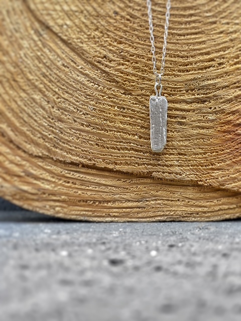 Raw pendant necklace