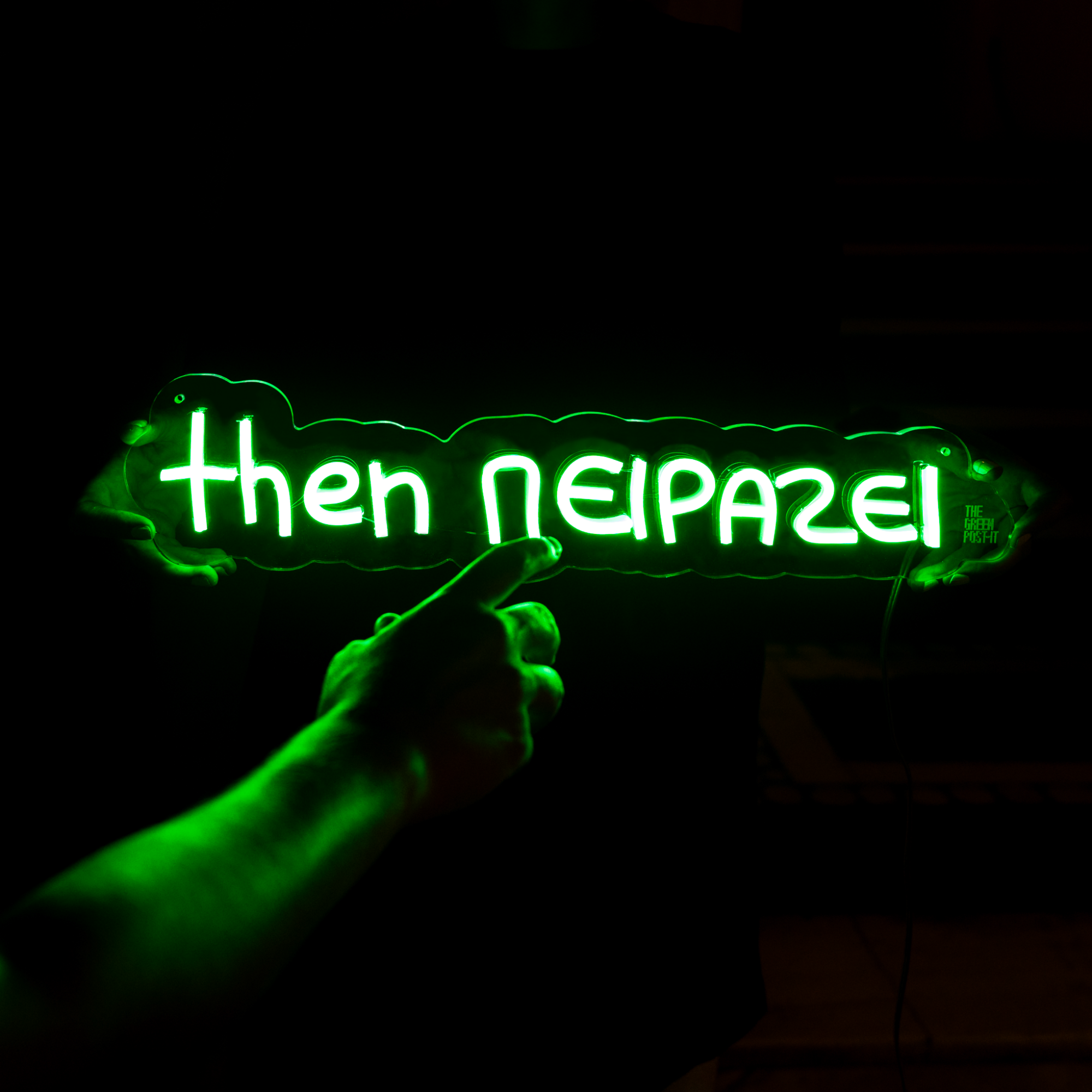 Neon sign ΄΄then πειράζει΄΄