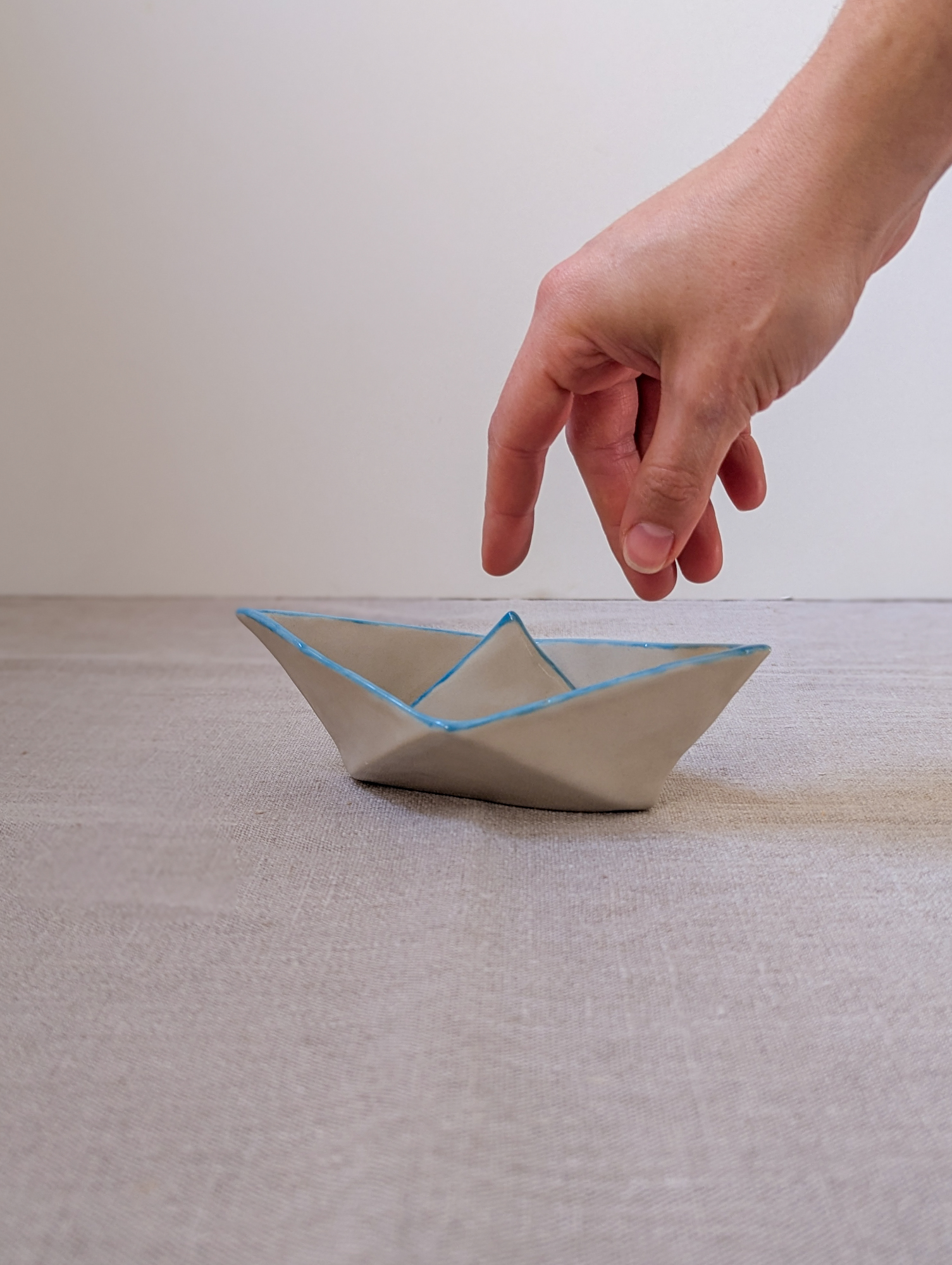 Ceramic paper boat