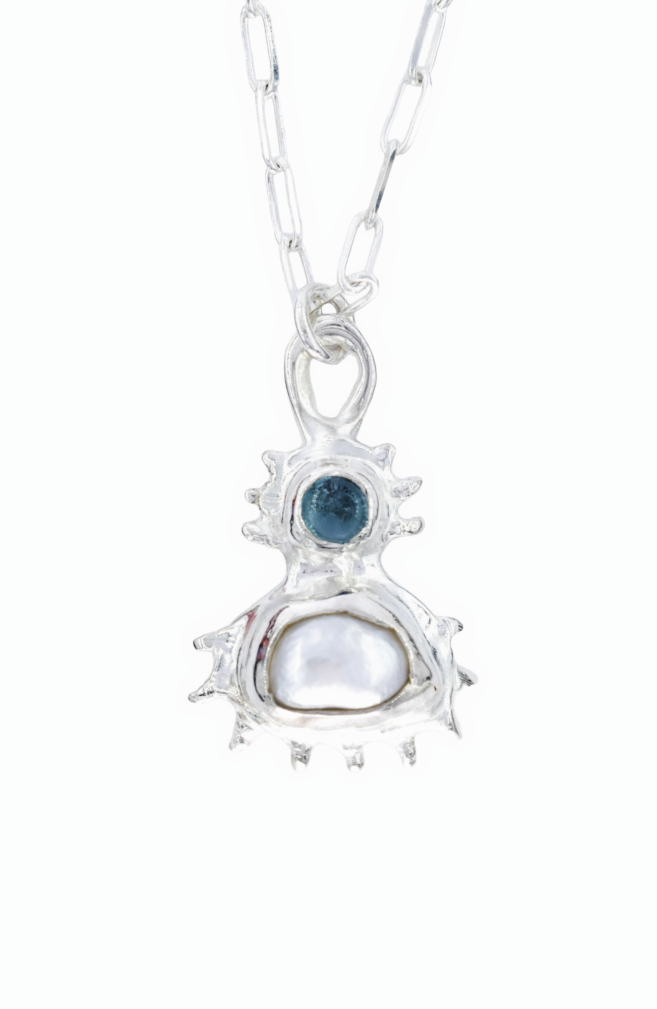 Coral inspired pendant with a blue topaz and a fresh water pearl