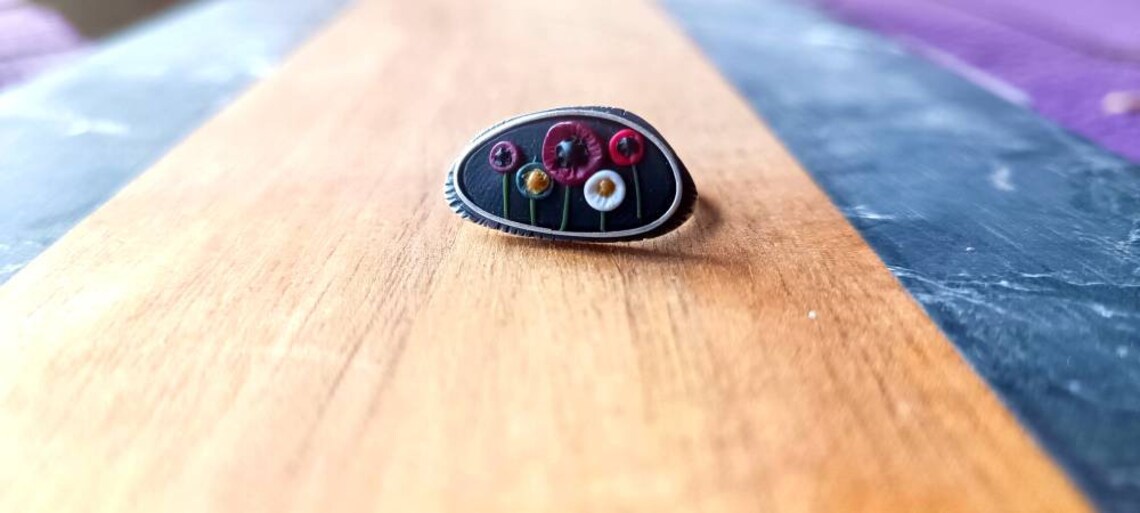 Ring of Poppies in black