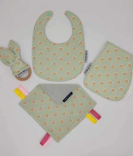 Baby Gift Set including: 
1 bib 
1 Burp Cloth
1 Teether
1 Security Blanket