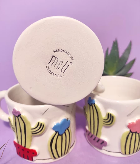 Ceramic mug with cactus