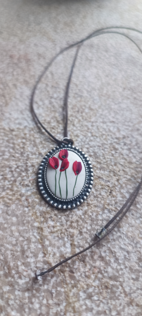 Full set of red poppies on white canvas