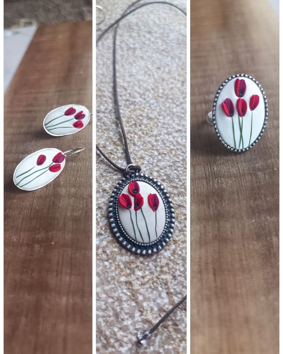 Full set of red poppies on white canvas