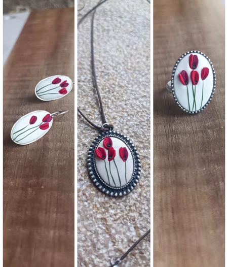 Full set of red poppies on white canvas