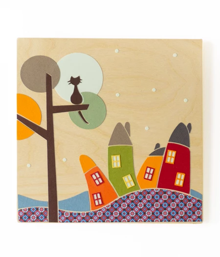Whimsical nursery decor on wood