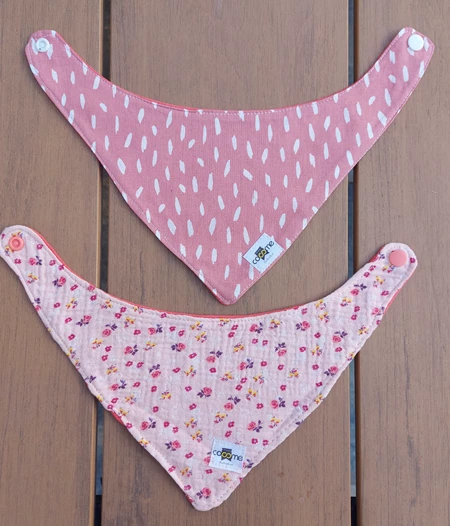 A set of 2 bandana bibs for stylish and clean babies