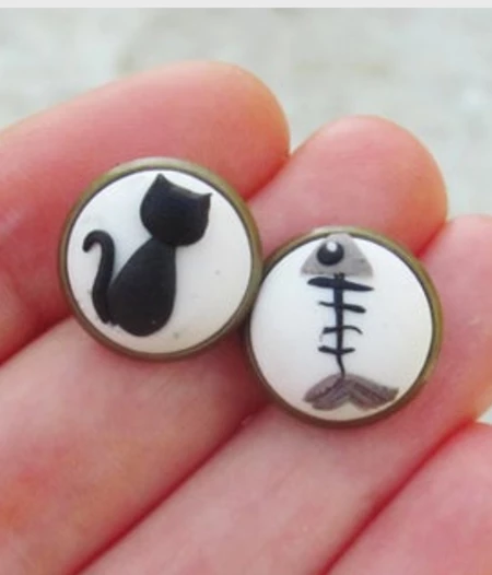 Paw and fish bone earrings
