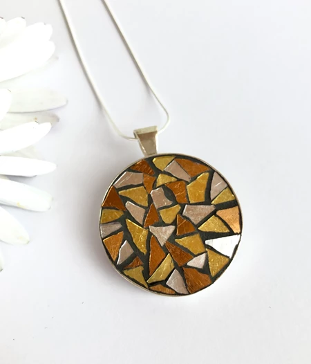 Golden sun pendant