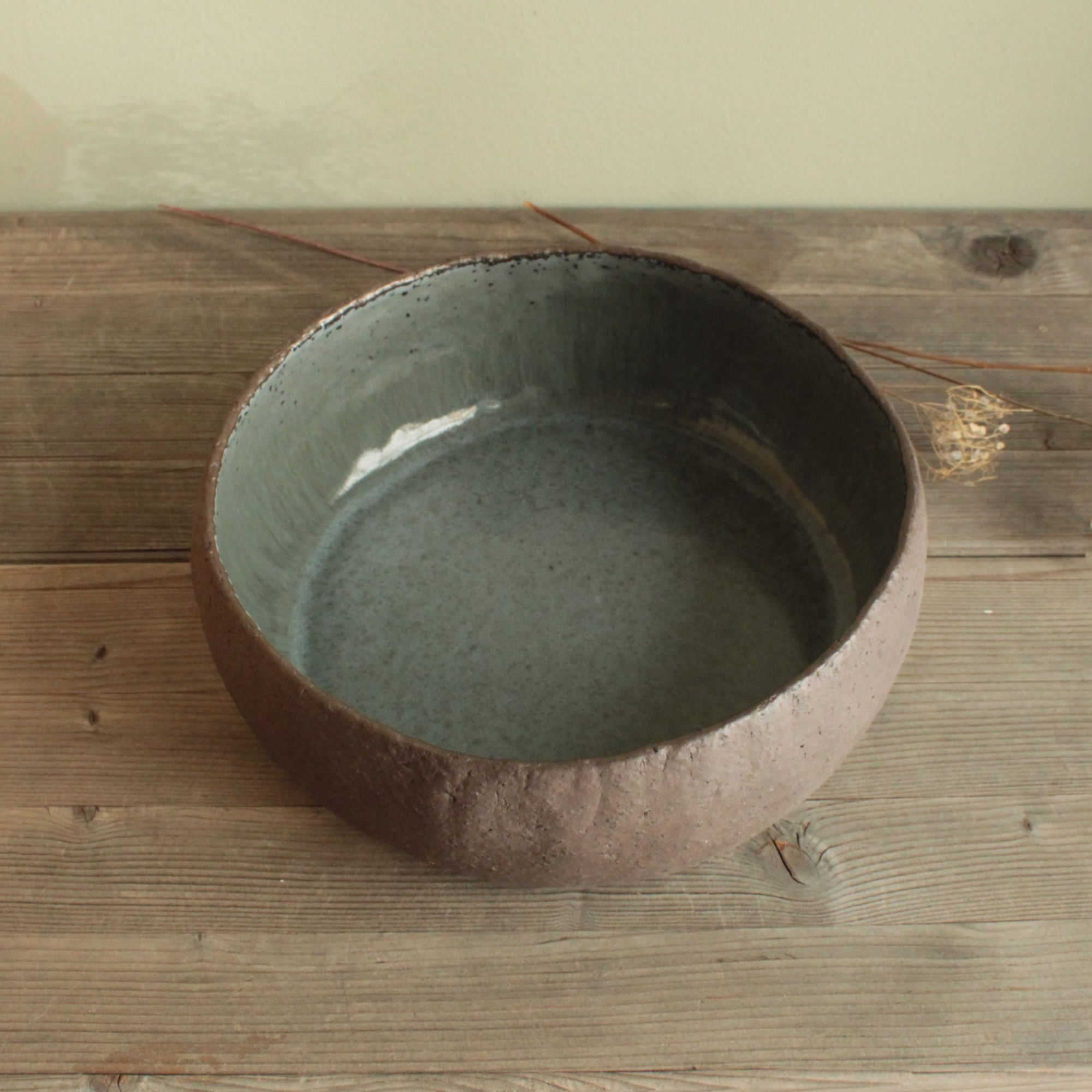 Brown bowl with ciel glaze