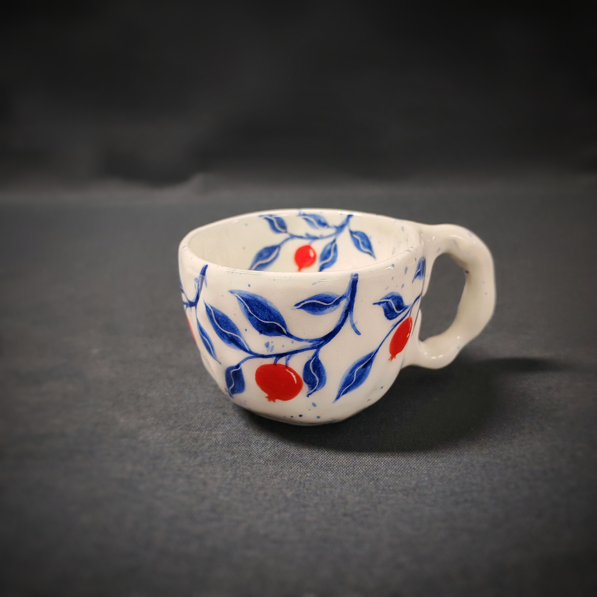 Set of 2 coffee cups with pomegranates and oval plate