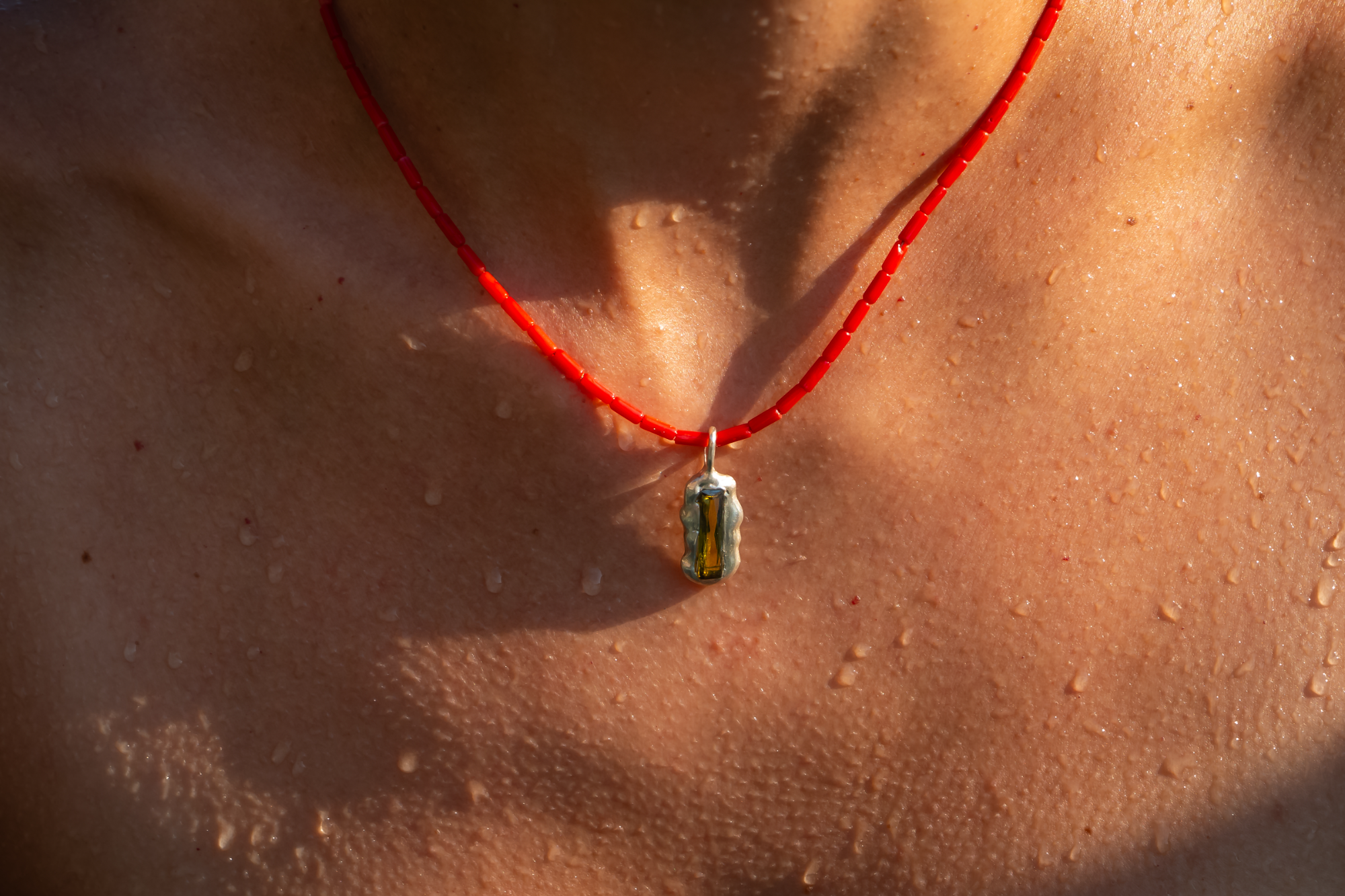 Silver Pendant with hidden zircon baguette