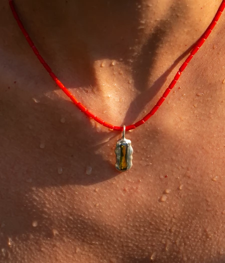 Silver Pendant with hidden zircon baguette