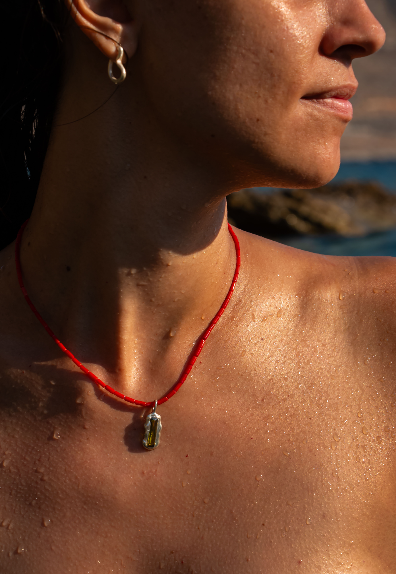 Silver Pendant with hidden zircon baguette