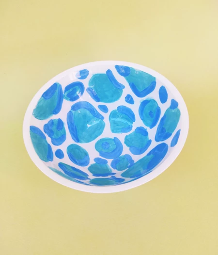 Handmade ceramic bowl with animal print