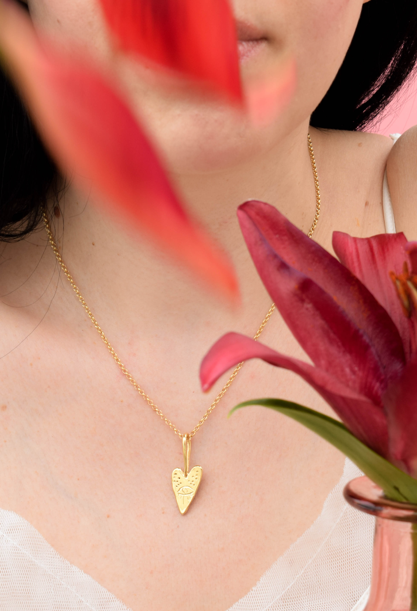 Heart necklace with an eye