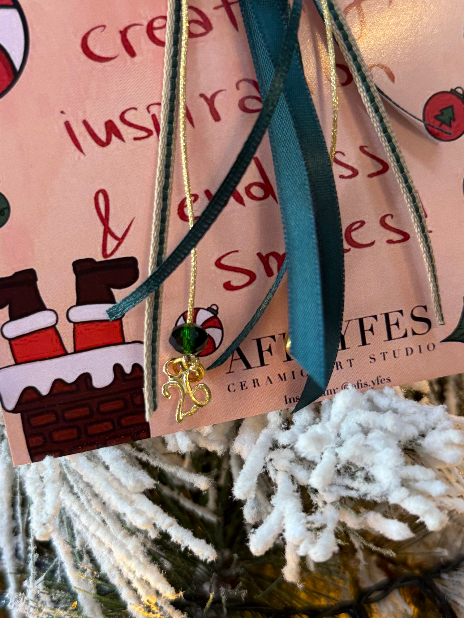 "Rudolf" Lucky charm on a greeting card