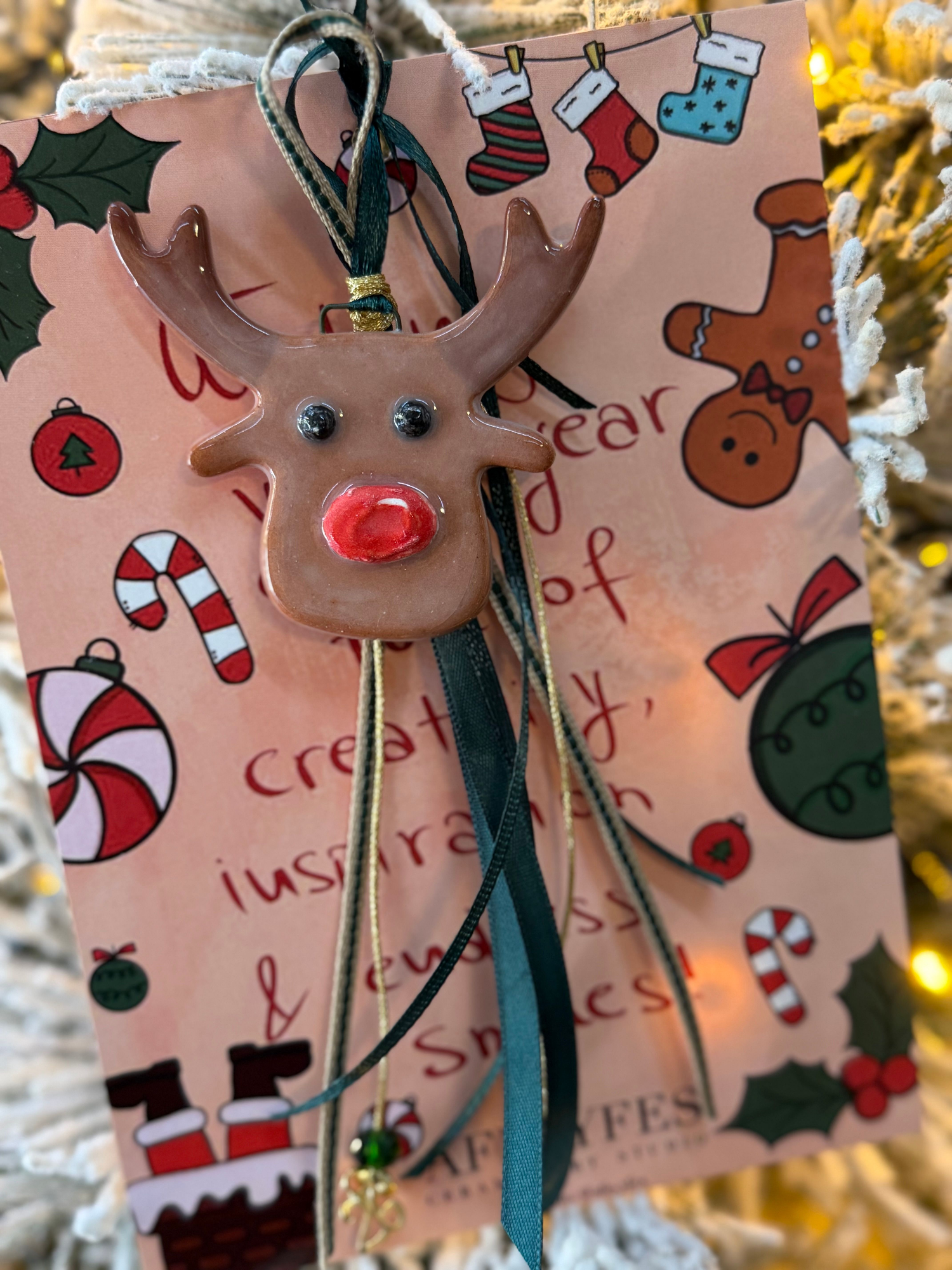 "Rudolf" Lucky charm on a greeting card