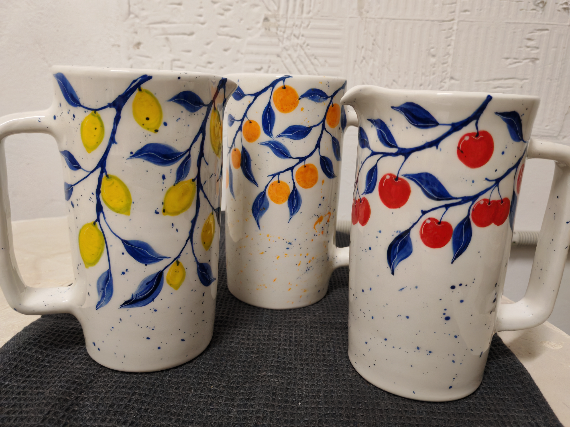 Ceramic jug and tumblers 