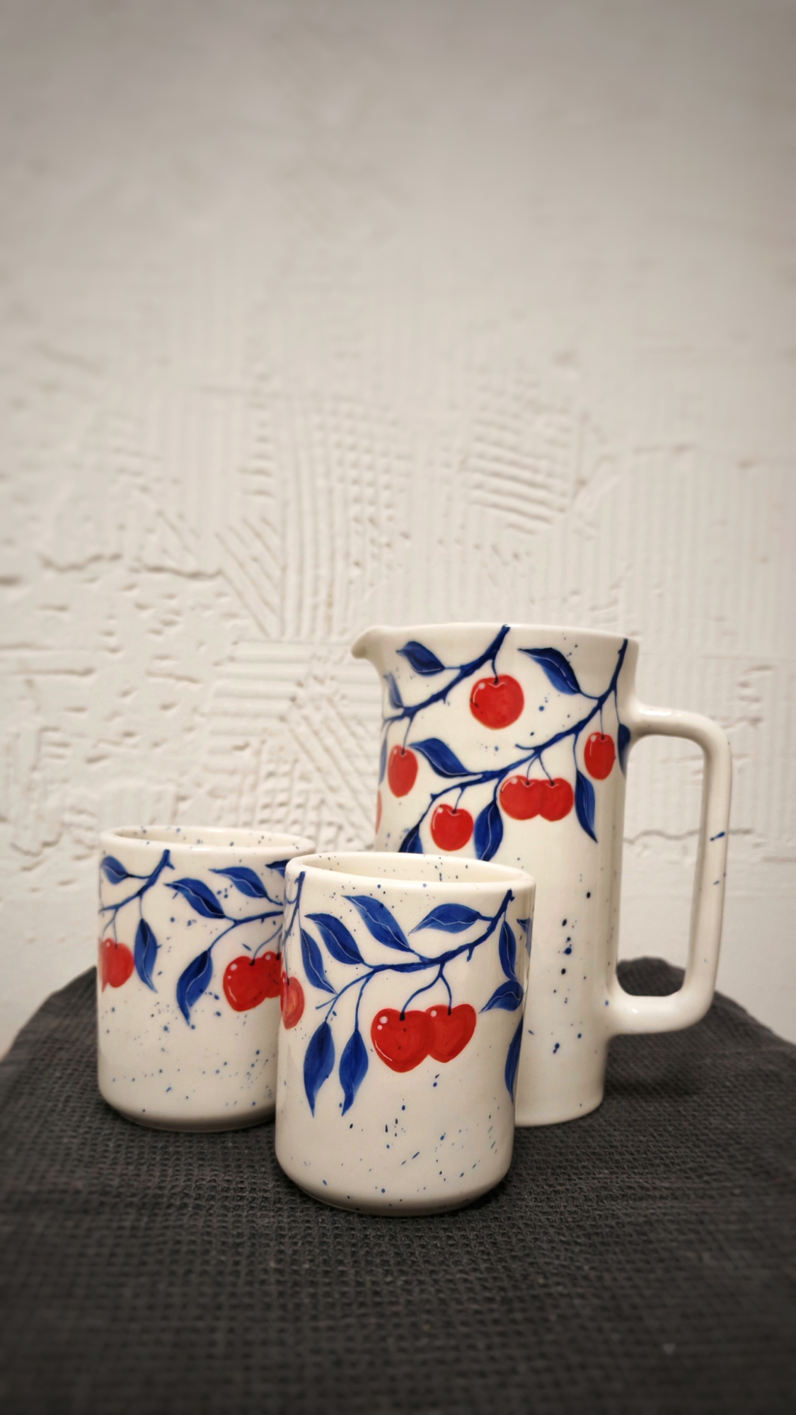 Ceramic jug and tumblers 